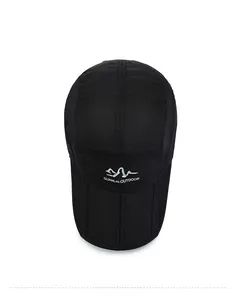 Macro view of breathable side mesh and brand embroidery on the black outdoor hiking cap