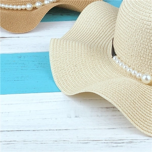 Foldable wide brim straw sun hat for women with elegant pearl trim in beige and khaki