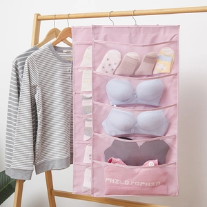 Pink hanging organizer for underwear and socks with mesh pockets and rotating hook