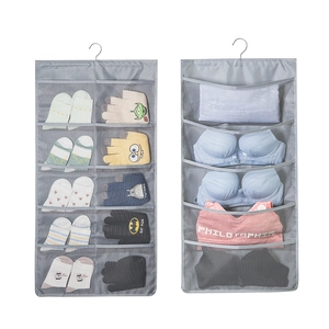 Dual-sided closet organizer featuring 15 mesh pockets with a 360-degree rotating metal hook