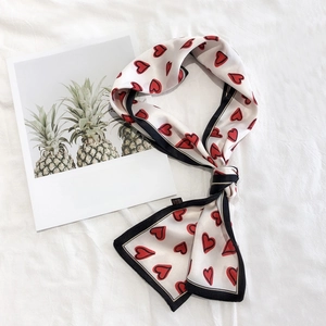 Fresh heart print narrow silk scarf with black and white borders on textured fabric