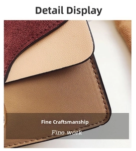 Detail view of tri-color crossbody bag featuring matte leather stitching and fine sewing