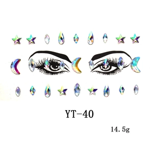 Detailed view of iridescent star and moon acrylic face gems on YT-40 packaging card