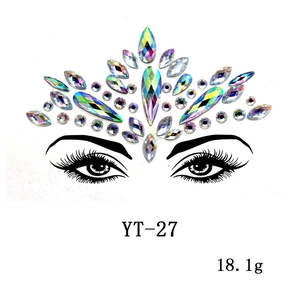 Detailed view of iridescent face gems and holographic rhinestones for masquerade parties
