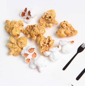 Macro shot of realistic popcorn resin charms for creative DIY earring and accessory making