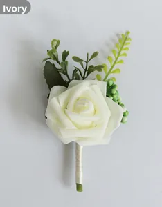 Detail of cream white PE rose boutonniere with green leaves and ribbon wrapped handle