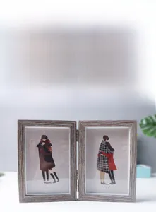 Detail of the 4x6 inch double folding picture frame with modern light wood texture