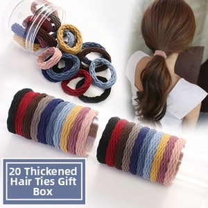 Close-up of 20 pieces thick elastic hair tie set with textured weave and clear storage jar