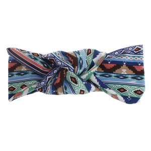 Detail of bohemian wide headband with ethnic geometric pattern and center twist knot design