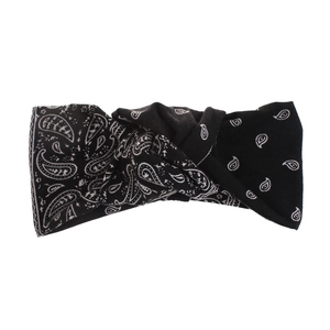 Detail of black paisley print headband with a stylish twisted knot design for women