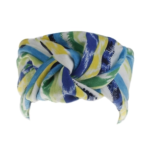 Detail of bohemian headband featuring colorful abstract oil painting patterns and center knot