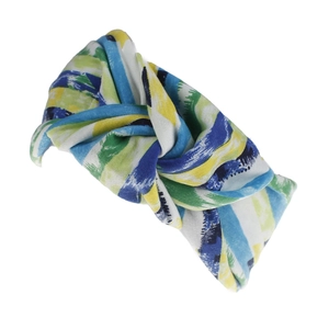 Detail of colorful knotted headband with bohemian watercolor print and soft fabric texture