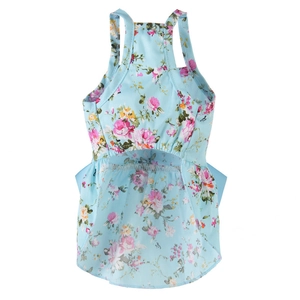Detail shot of blue floral cotton puppy princess dress with pink and yellow flower patterns