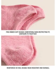 Detail of pink cotton socks featuring reinforced heels and fine-ribbed cuffs for comfort