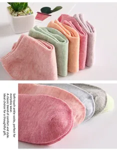 Detailed macro view of macaron colored cotton socks showing fine knitted texture and seams