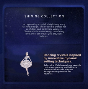 Detail of ballet dancer brooch featuring rose gold plating and crystal inlay on dark background