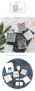 Minimalist white jewelry gift box set with matching paper bag and elegant grey foam insert