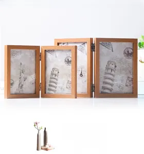 Close-up of a folding natural wood photo frame with multiple slots and rustic grain