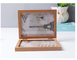 Detail of 5x7 inch double folding wood photo frame with vintage Eiffel Tower illustration