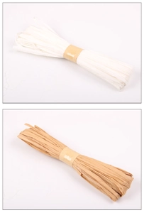 Detail of eco-friendly raffia paper twine in cream and khaki for DIY gift wrapping