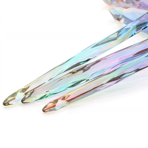 Close-up of aurora crystal makeup brush handle with premium faceted diamond cutting