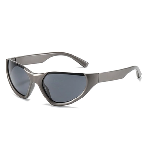 Futuristic silver cat-eye sports sunglasses with wrap-around shield design and dark lenses
