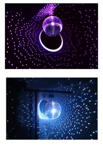 Detail of mirror disco ball reflecting vibrant purple and blue light spots for party decor