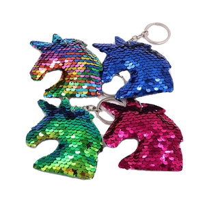 Sparkly reversible sequin unicorn keychains in rainbow, blue, green and pink colors
