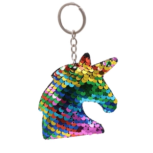 Rainbow sequin unicorn keychain with silver metal ring on a white background