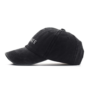 Vintage washed black cotton baseball cap with embroidered Chance lettering on a soft top