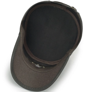 Interior detail of dark brown cotton cadet cap showing sweatband and flat top lining