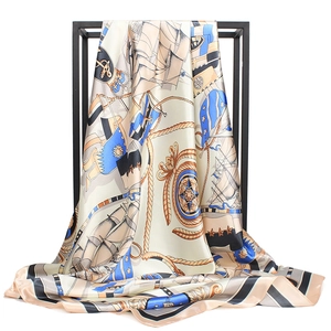 Detail view of 90x90cm nautical printed silk scarf featuring sailboats and anchors