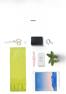 Light green bedside organizer bag with pockets for remote control and tablet
