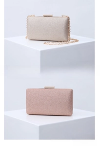 Detail showing champagne and rose gold sequin evening clutch bags with chain straps