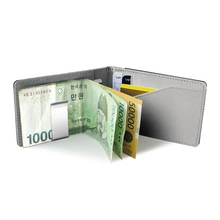 Detail of grey PU leather card holder with integrated metal money clip and card slots