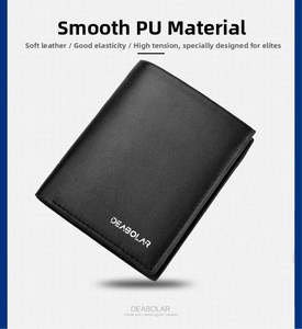 Close-up of black PU leather men's wallet with fine texture and stitched edges