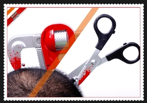 Detail of Halloween bloody wrench and scissors headband with realistic gore special effects