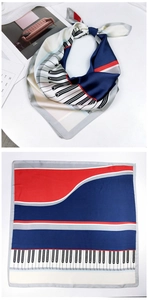 Detail of silk scarf with piano key pattern and color block patchwork in folded view
