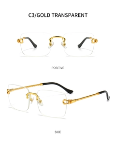 Detailed view of square rimless sunglasses with gold twisted metal temples and clear lenses