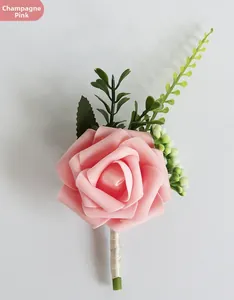Detailed close-up of champagne pink PE rose boutonniere with ribbon wrapped stem