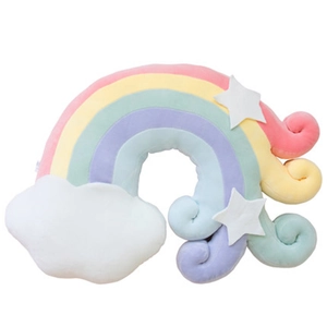 Rainbow plush pillow with white stars and clouds in soft pastel colors for home decor