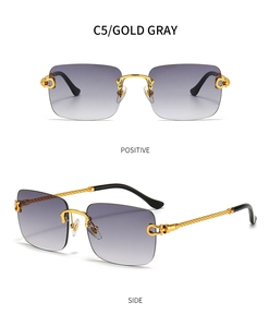 Detail of square rimless sunglasses with gold twisted metal temples and gradient gray lenses
