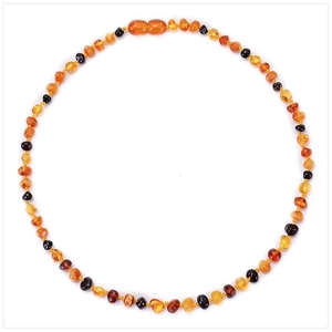 Flat lay of a multicolor Baltic amber teething necklace for babies with a screw clasp