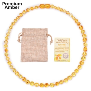 Premium Baltic amber baby necklace with linen storage pouch and authenticity certificate