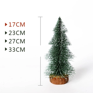 Mini frosted Christmas tree with pine needles and natural wood base in various sizes