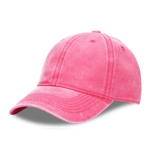 Pink washed cotton baseball cap with vintage distressed texture and curved brim
