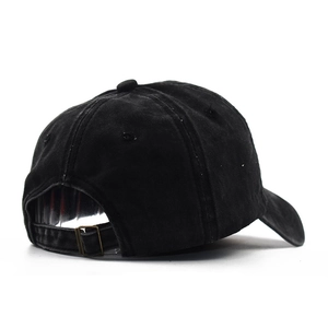 Detail view of washed cotton baseball cap featuring adjustable metal buckle on the back