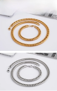 Detailed macro view of 18K gold and silver chunky cuban link chain and bracelet sets
