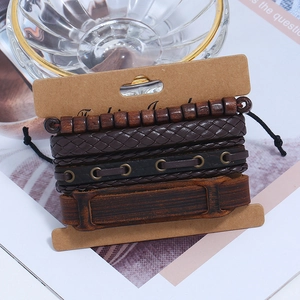 4-piece set of brown vintage braided leather bracelets with wooden beads and metal charms
