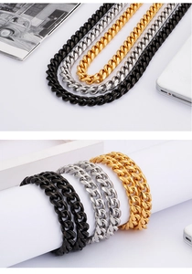 Dettagli del set collana e bracciale a maglia cubana da 9mm in oro, argento e nero